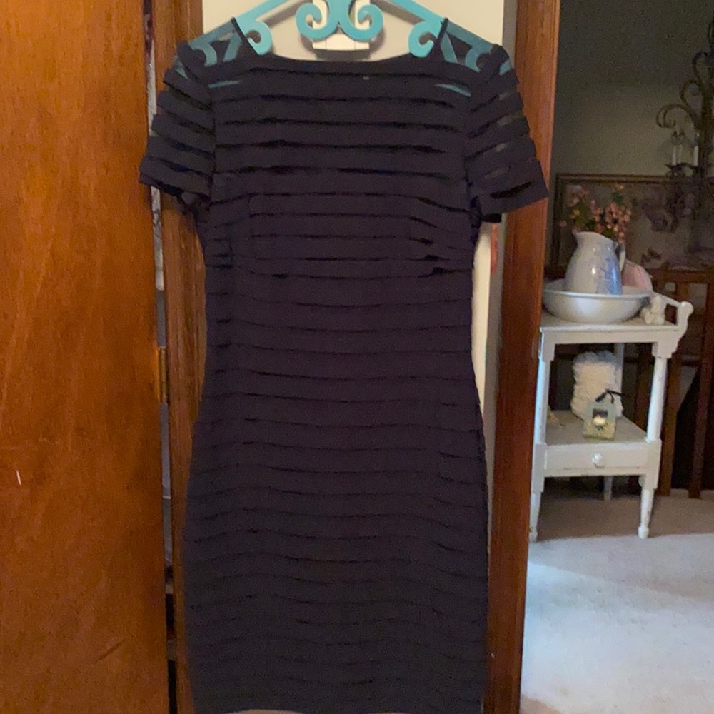A women’s blue dress size 8